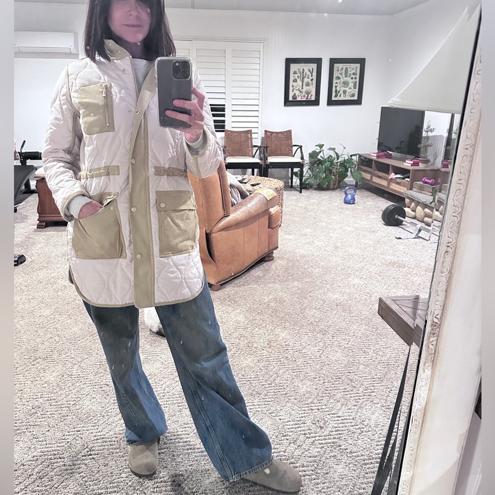 Barn jacket. You can cinch in the waist with draw string.  Size M.